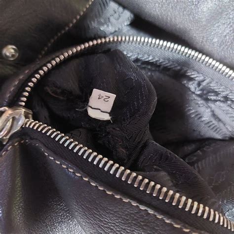 ipi zipper prada|prada logo identification.